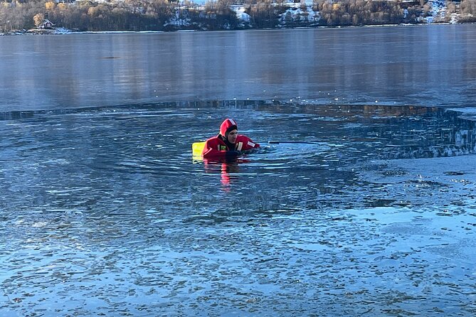 3-Hour Shared Arctic Morning Floating Experience in Norway - Getting into the rescue suit
