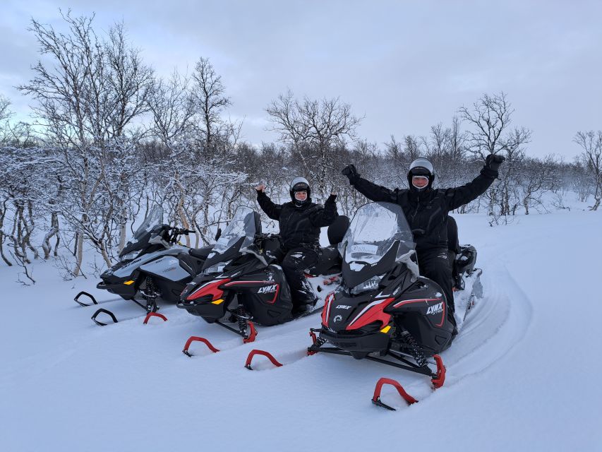 Alta: Guided Snowmobile Safari on Finnmarksvidda With Snacks - Riding across the frozen lakes of Finnmarksvidda