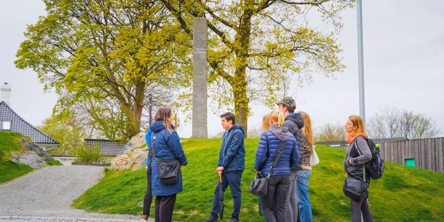 Bergen: Nordnes Neighborhood Hidden Gems Walking Tour - The meeting point inside a historic white building