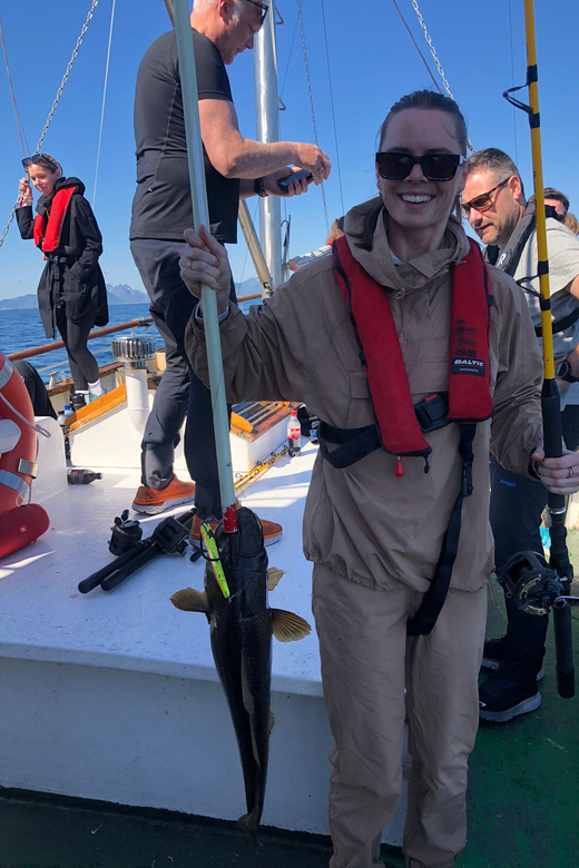 Fishing trip from Henningsvær - Meeting at the yellow Lofoten Opplevelser building