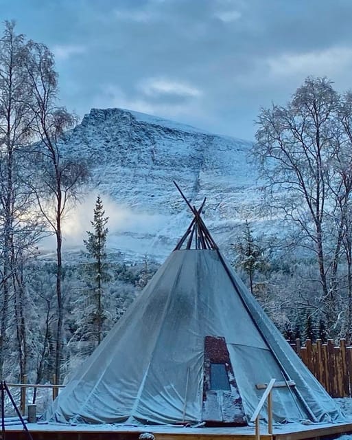 From Tromso: Arctic Wilderness Snowmobile Daytime Tour - Leaving Tromsø for the Lyngen Alps