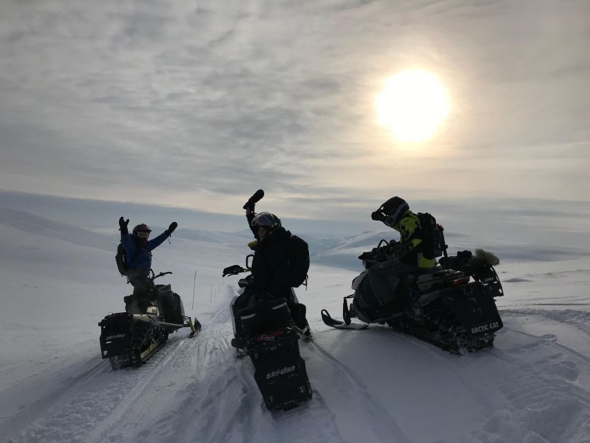 From Tromso: Arctic Wilderness Snowmobile Daytime Tour - Getting fitted out at Lyngskroa
