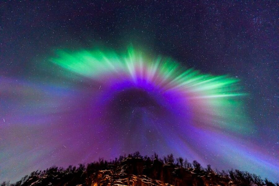 From Tromsø: Aurora Minibus Chase with Portrait and Hot Meal - Meeting at Ami Hotel and gearing up for the Arctic