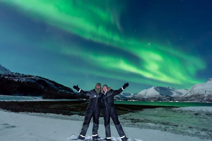 From Tromsø: Aurora Minibus Chase with Portrait and Hot Meal - Waiting beside lakes, bays, and campfires