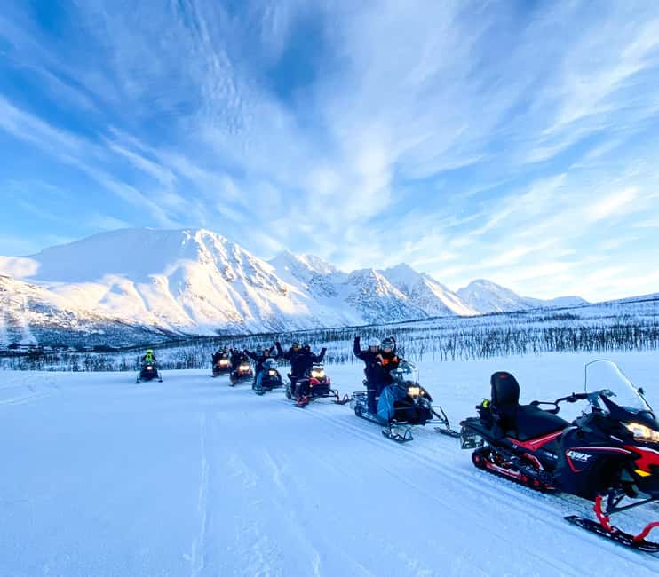 From Tromsø: Lyngen Alps Guided Snowmobile Tour - Guides, group size, and the human side