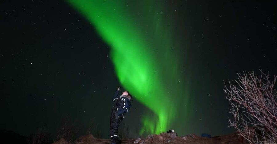 From Tromsø: Northern Lights Tour with Hot Drinks and Photos - Starting at the Tromsø City Library