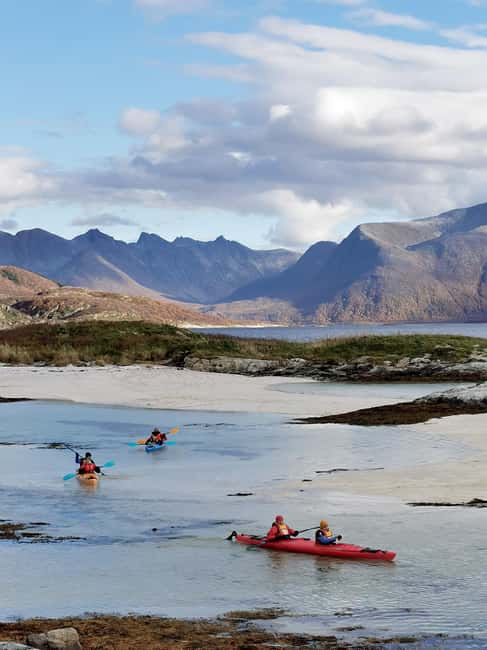 From Tromsø: Sea Kayaking Tour at Sommarøy with Transfer - The second paddle through shallow sandy water