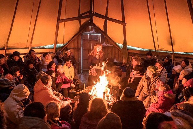 Night Reindeer Sledding with Camp Dinner and Chance of Northern Lights - Dinner in the candlelit Gamme