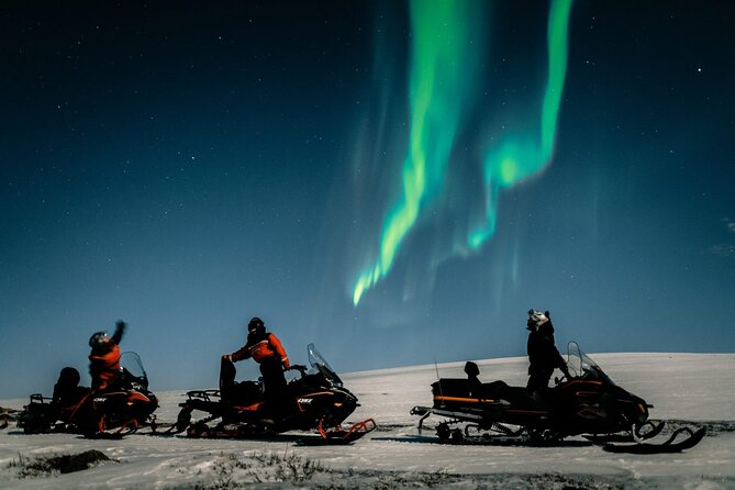 Northern Lights Adventure By Snowmobile - Sharing a snowmobile and taking the controls