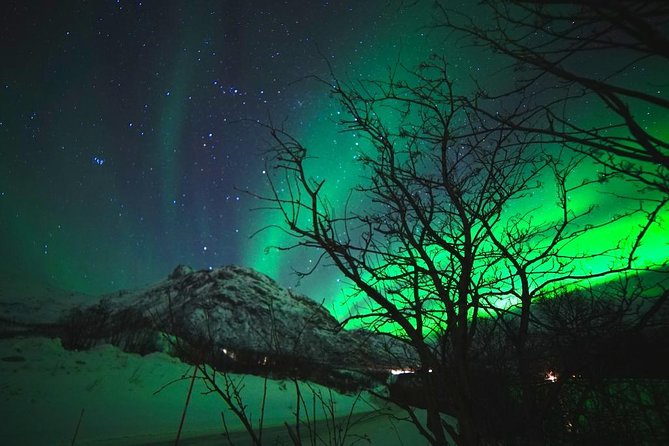 Northern lights - TeslaX Ecofriendly Car - Finding a break in the clouds
