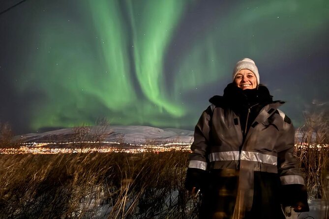 Northern Lights Tour with Hot Food and Drinks in Tromso - Bonfire food beside the fjord