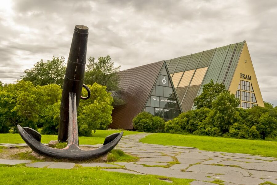 Oslo: Grand City Sightseeing Tour by Bus with Fjord Cruise - Walking Through Vigeland Sculpture Park