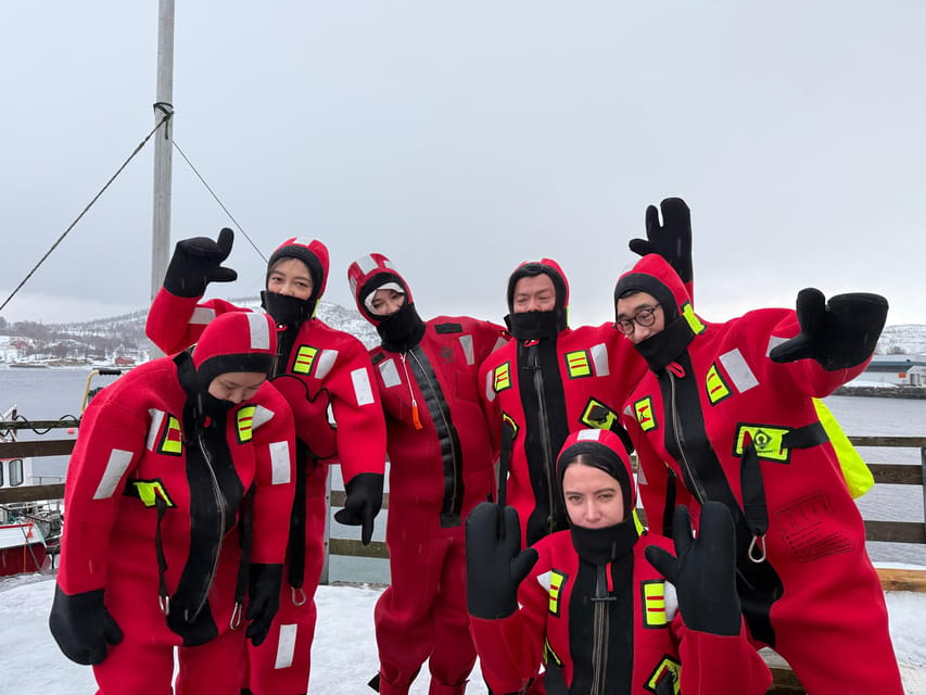 Tromsø: Arctic Fjord Floating in Survival Suit - The optional dock jump