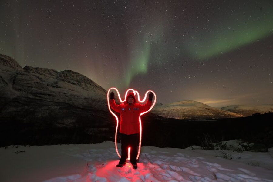 Tromsø: Aurora Borealis, Campfire, Hot Meal, Arctic Tour - Thermal suits, icy ground, and the campfire