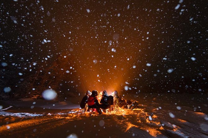 Tromso Aurora Hunt with Bonfire, Soup, Winter Gear & Transfers - Thermal suits, boots, and staying warm