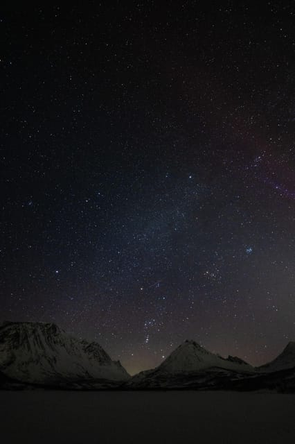 Tromsø: Aurora Tour with Photos, Campfire and Arctic Food - Chasing clear skies instead of waiting in one place