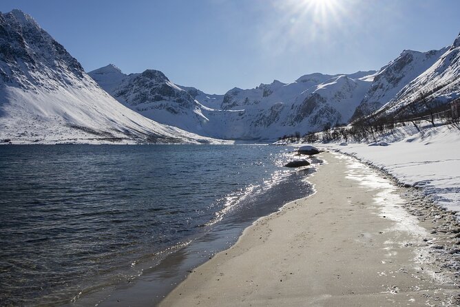 Tromso fjords road trip with fire in grill cabin by the beach. - Why this road trip works well from Tromsø