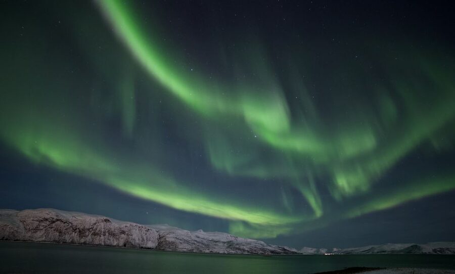 Tromso: Northern Lights Chase with Photo Package Included - Leaving Tromsø after dark