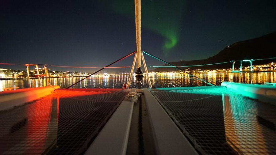 Tromsø: Northern Lights Luxury Catamaran Cruise - The Panorama Saloon and outdoor daybeds