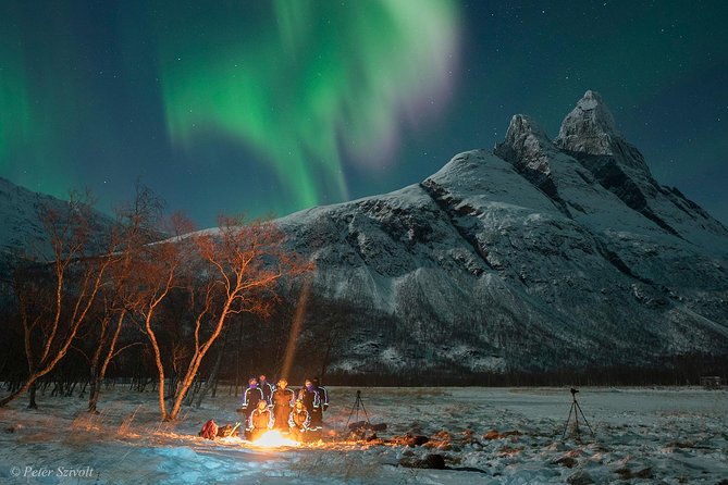 Tromso Northern Lights Minibus Chase Small Group Tour with Photos - Leaving Tromsø in expedition gear