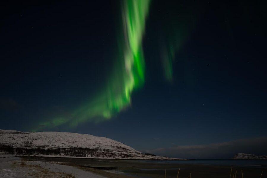Tromsø: Small-Group Adventurous Northern Lights Hunt - Snow paths, frozen lakes, and quieter viewing places